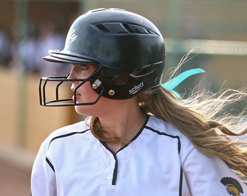 Image: Hannah Washington(8) makes her approach to the batter’s box.