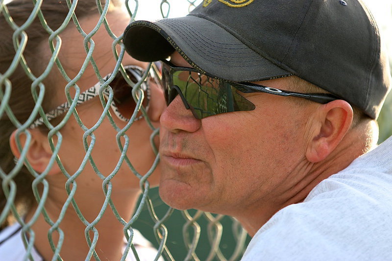 Image: Lady Gladiator Amber Hooker takes a moment to welcome back her father, Jerry Hooker, who has been gone for a week of firefighter training.