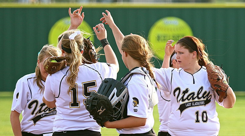 Image: Senior first-baseman Paige Westbrook(10) and the Lady Gladiator infielders are ready to take on Grand Prairie Advantage Academy during the first game of a double-header on Friday.