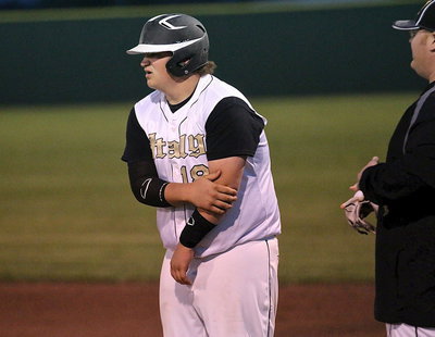 Image: Junior Gladiator John Byers(18) doesn’t feel like laughing after his funny-bone got smacked by a pitch.