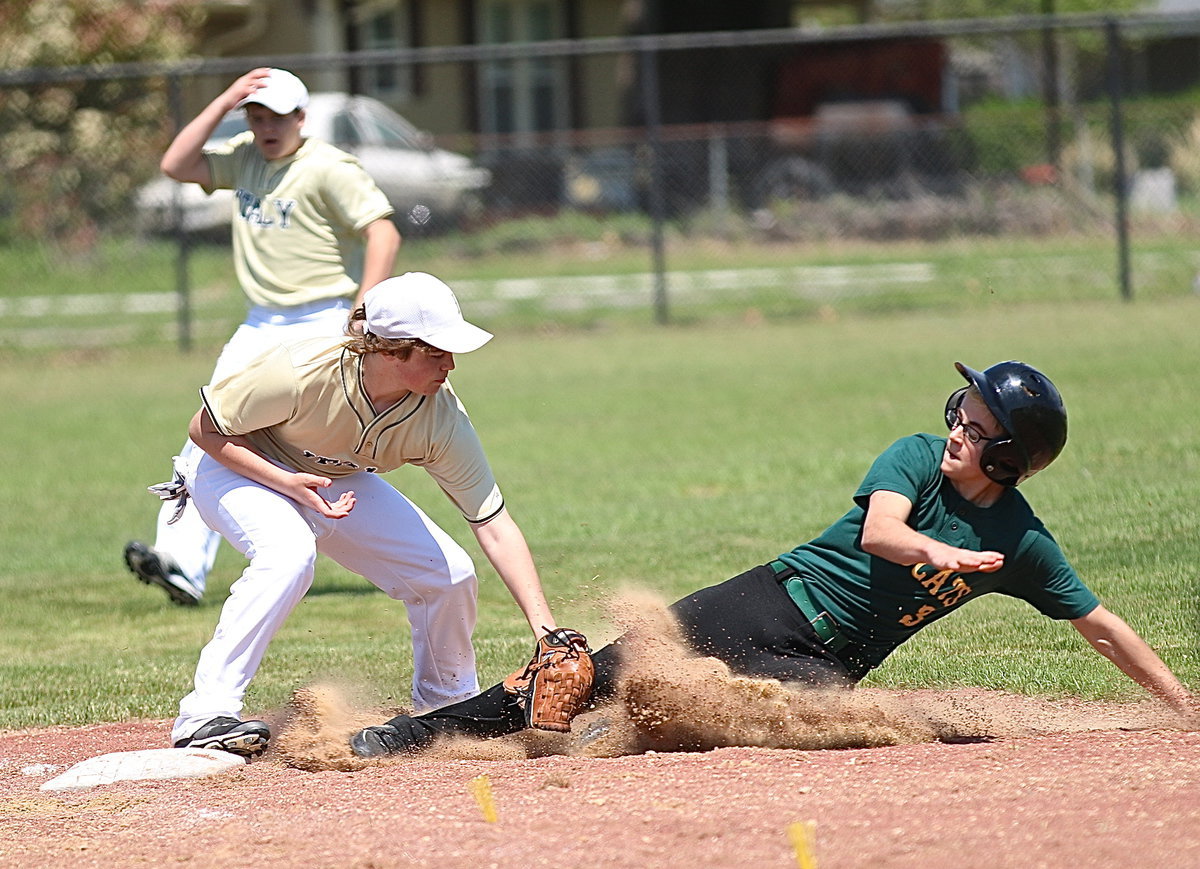 Image: IYAAs Cade Roberts makes the tag at third base against Itasca.