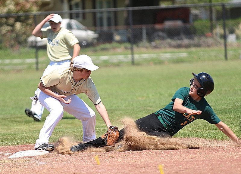 Image: IYAAs Cade Roberts makes the tag at third base against Itasca.