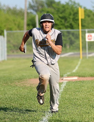 Image: Tyler Anderson(9) was determined to help his Gladiators claim the district championship.