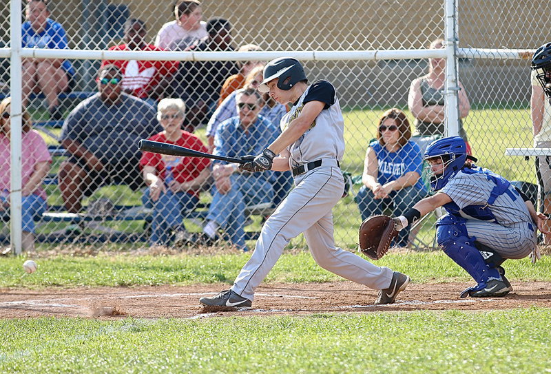 Image: Gladiator Ryan Connor(4) with a thunderous rip to help keep the pressure on the Bulldogs.
