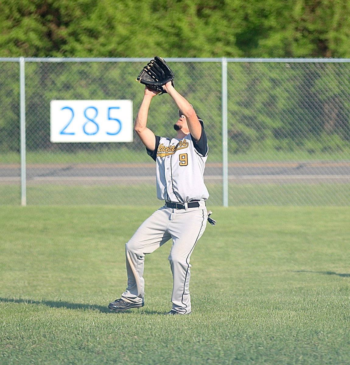 Image: Tyler Anderson(9) gets under a pop-up to make the catch from his shortstop position for the Gladiators.