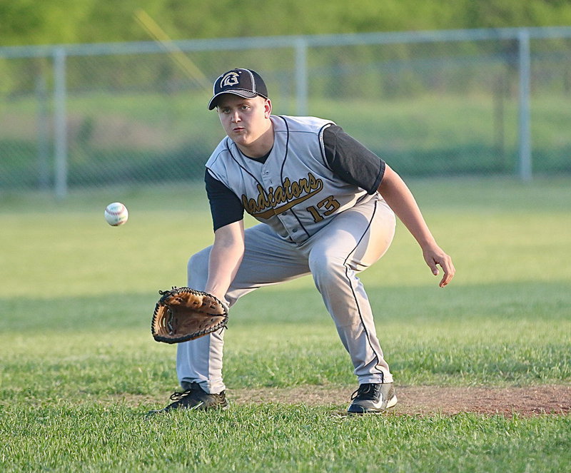Image: Gladiator senior Bailey Walton(13) shows the skills at first-base.
