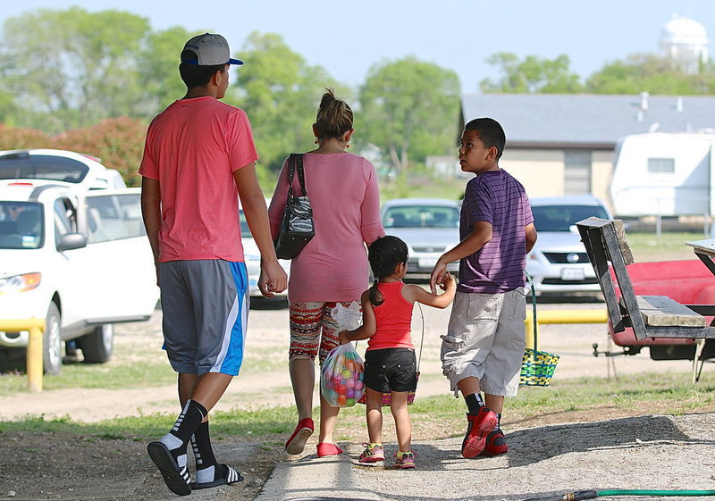 Image: Gladiator David De La Hoya heads home with his family after the Easter egg hunt at the Upchurch Ballpark.
