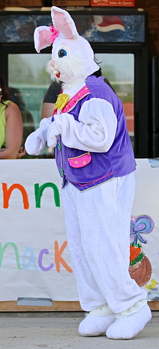 Image: Breyanna Beets doing The Bunny Hop to keep everyone entertained before the egg hunts begin.