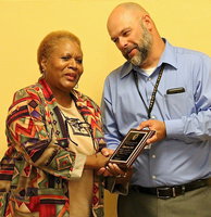 Image: For dedication and service to the Italy ISD students when a void in the classroom needed to be filled with reliability, Principal Lee Joffre presents Elmerine Bell with a personalized appreciation plaque.
