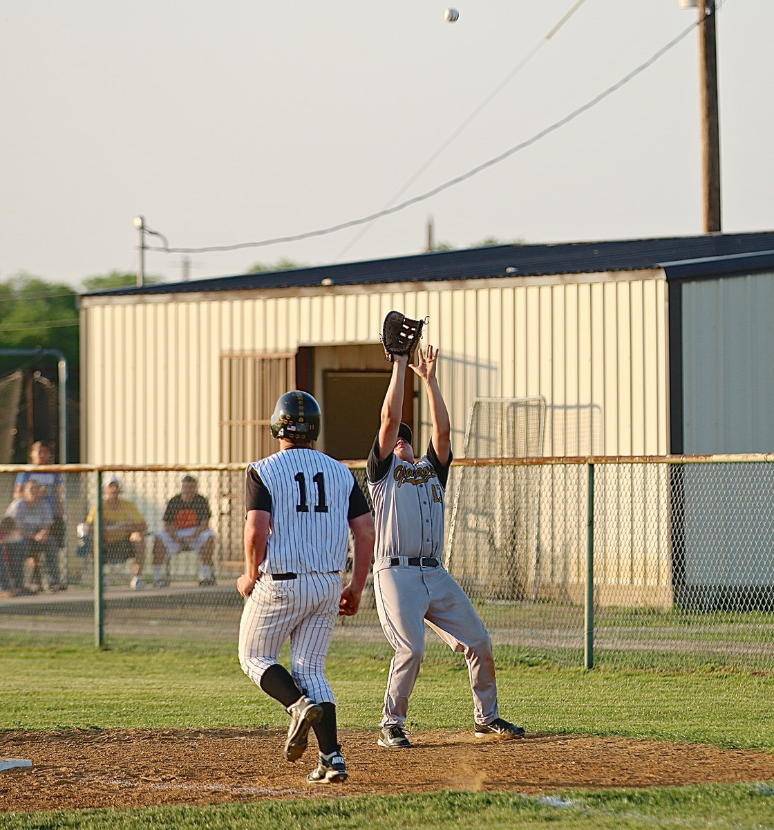 Image: Bailey Walton(13) gets under a high pop-up at first-base. FYI, Bailey caught it!