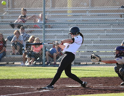 Image: Lady Gladiator Lillie Perry(9) was a weapon against Mart and had a big game swinging the bat with a single and a double.