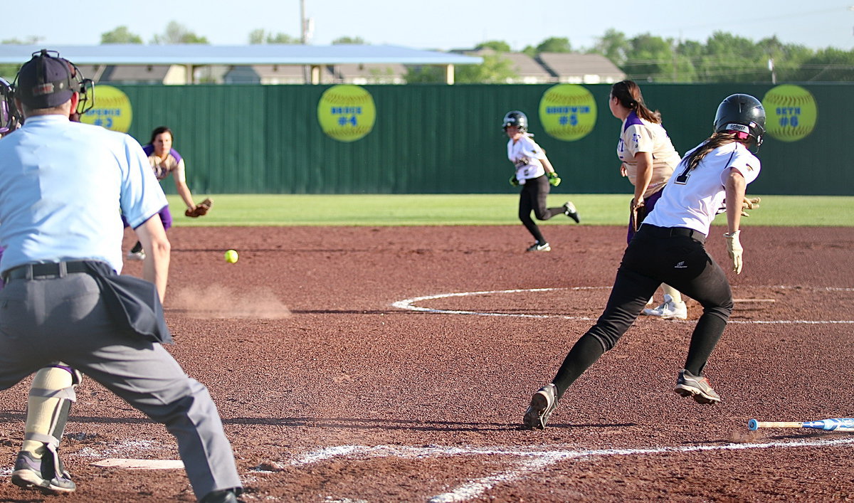Image: Bailey Eubank(1) puts pressure on the Mart defense with a grounder to short.