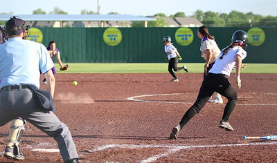 Image: Bailey Eubank(1) puts pressure on the Mart defense with a grounder to short.