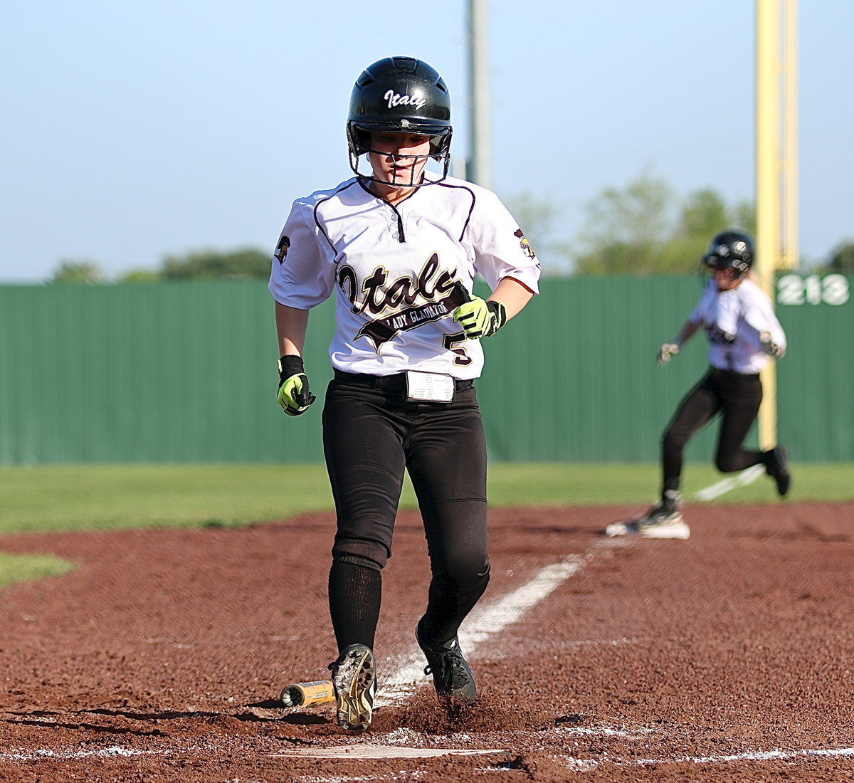 Image: Tara Wallis(5) scores followed by Britney Chambers(4) thanks to a big hit from teammate Kelsey Neslon.