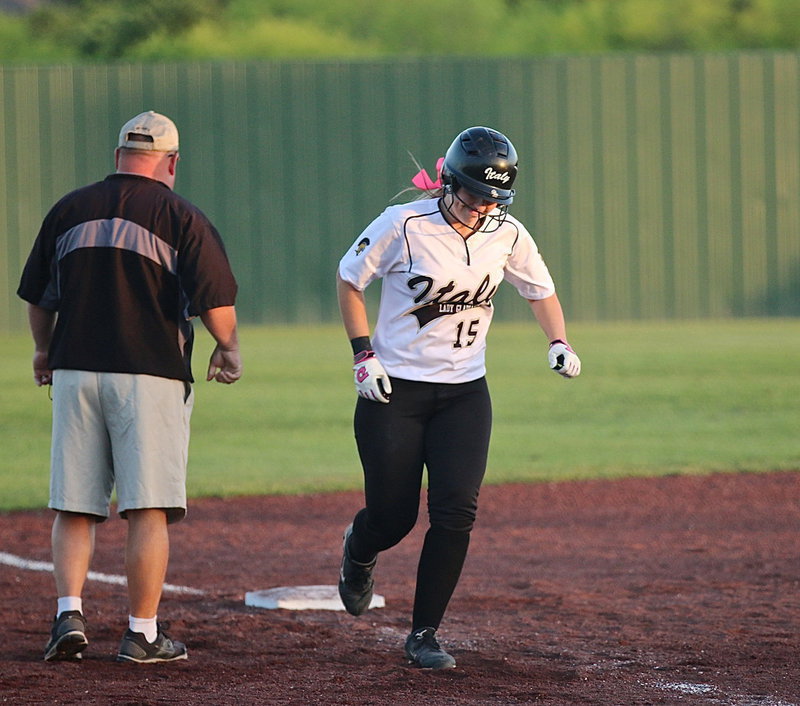 Image: …so Jaclynn obliges her coach with a solo homerun shot over the centerfield fence to pull Italy within one run of Mart, 9-8.