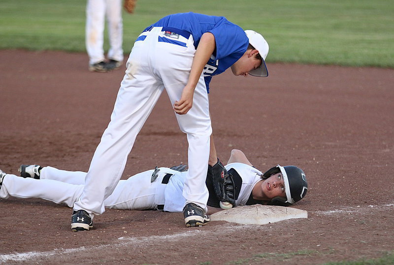 Image: The stare down: An awkwardly long stare down between Italy’s Ty Windham(12) and the Frost first-baseman ends when Windham eventually calls for time.