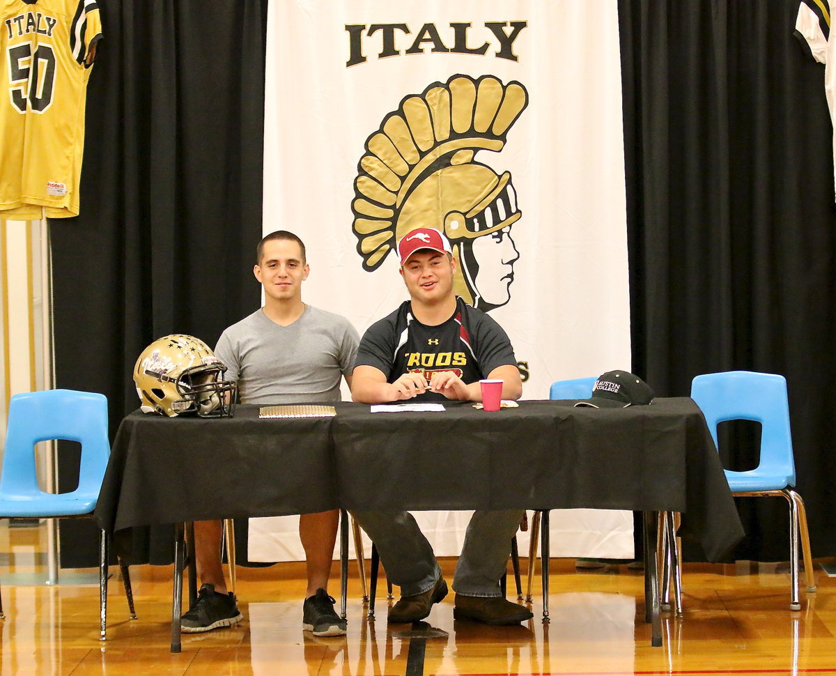 Image: Fellow Gladiator Cody Medrano shares in the moment with his tackling compadre Zain Byers after Byers signed his commit to play football for Austin College. Both played IYAA pee-wee football together, select football, then junior high, JV and varsity football together.