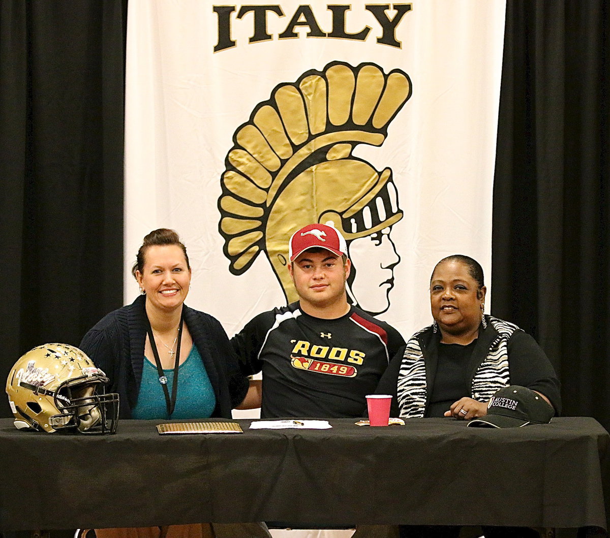 Image: Teacher mentors Casey Holden and Vivian Moreland were on hand to celebrate the accomplishment with Zain Byers. Is it any wonder that Zain plans to major in education and be a math teacher and coach to high school students?