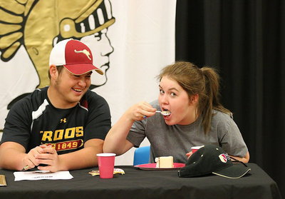 Image: Now it’s a party! Taylor Turner shares the moment with her senior classmate Zain Byers, but she ain’t sharing no cake!