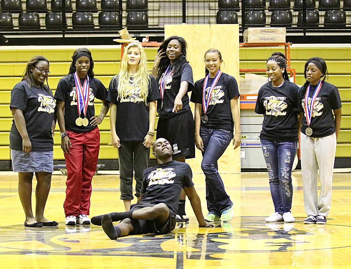 Image: TaMarcus Sheppard thinks he is the prize as he and Brenya Williams, Kortnei Johnson, Halee Turner, Janae Robertson, April Lusk, Bernice Hailey and Kendra Copeland have some fun during the photo shoot.