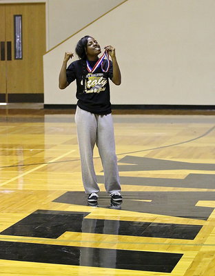 Image: Senior Kendra Copeland enjoys the taste of success after helping to bring home the silver medal as a part of Italy’s Girls Sprint Relay team.
