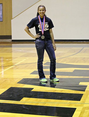 Image: April Lusk helped bring home the silver medal as a part of Italy’s Girls Sprint Relay team.