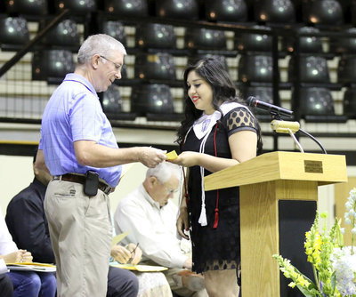 Image: David Shoeford presents a Lone Star Cyclists Scholarship to Monserrat Figueroa.