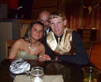 Image: Tara Wallis and Cody Boyd try to overcome a photobomb by Mr. Joffre.