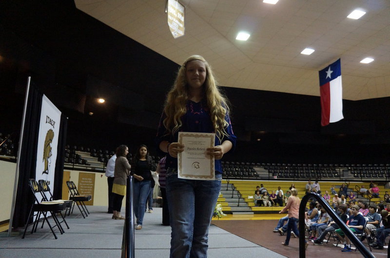 Image: Brycelen “Cha Cha” Richards, 8th grader, received an “All A’s” certificate.