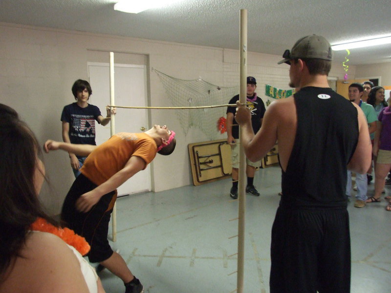 Image: Cody Medrano starts the limbo session.