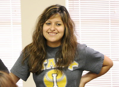 Image: Jessica Garcia is ready for her turn to play the survivor game.