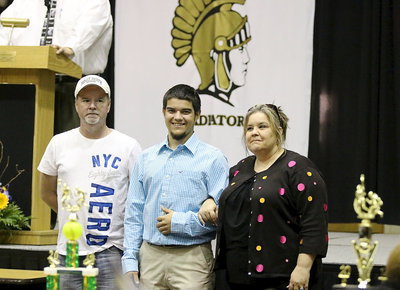 Image: In recognition of Italy’s 2013-2014 senior student-athletes, Tyler Anderson is introduced while being escorted by his parents.