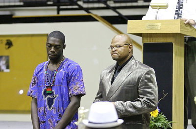 Image: In recognition of Italy’s 2013-2014 senior student-athletes, Khumbo Bailey is introduced while being escorted by Coach Bobby Campbell.