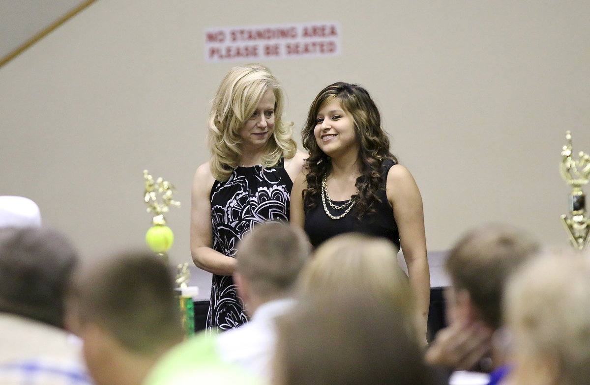 Image: In recognition of Italy’s 2013-2014 senior student-athletes, Jessica Garcia is introduced while being escorted by Jane Medrano.