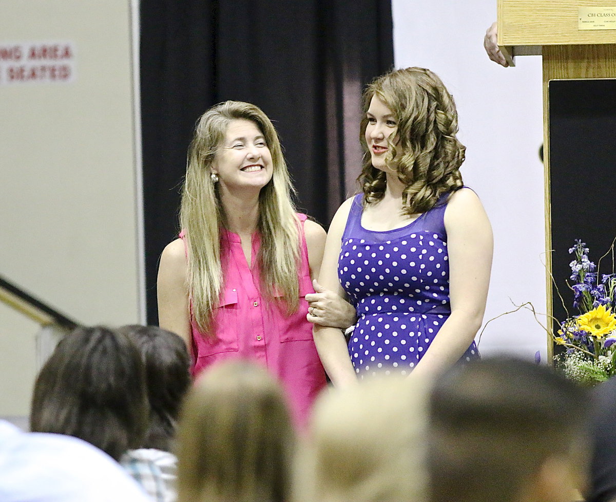 Image: In recognition of Italy’s 2013-2014 senior student-athletes, Taylor Turner is introduced while being escorted by her mother.