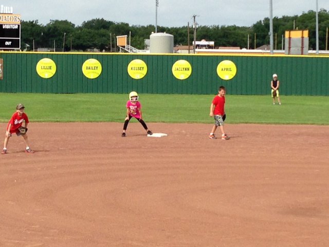 Image: The guys try to hold a runner at second.
