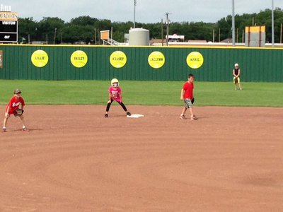 Image: The guys try to hold a runner at second.