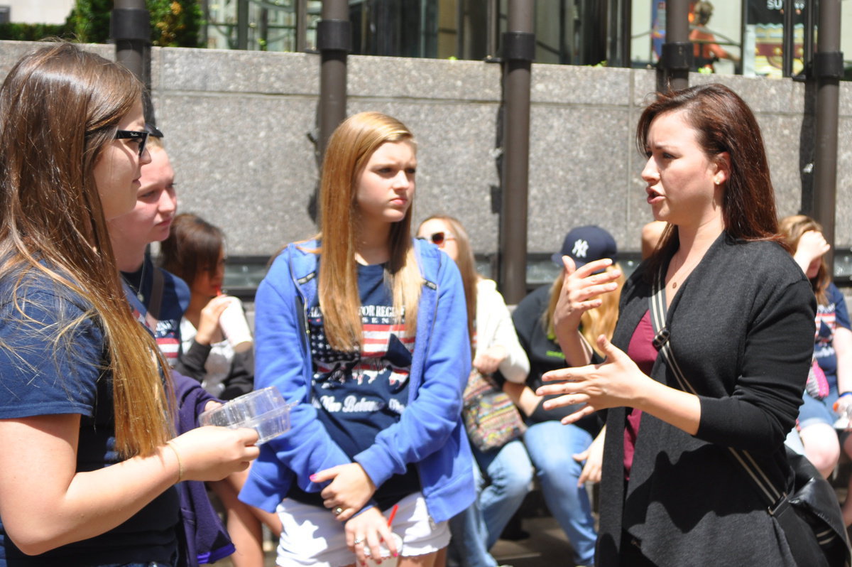 Image: Reagan Adams, Rachel Huskins, Kirsten Viator, listen to Grace Stevens a 2000 Graduate of Italy High School share about life in NYC.  Grace took time out of her schedule to talk and welcome some hometown Italians to the Big Apple.