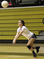 Image: Lady Gladiator Cassidy Childers practices returning the ball during Italy’s volleyball 2-a-day practices inside the Coliseum.