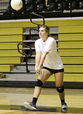 Image: Lillie Perry prepares to bump the ball.