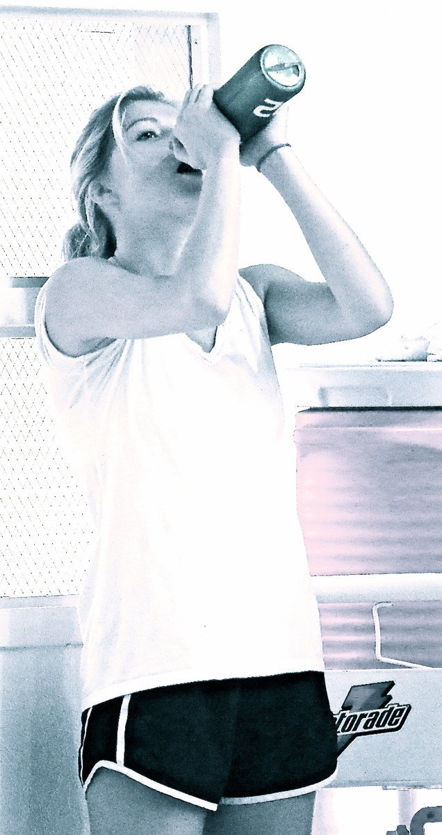 Image: Halee Turner hydrates during a break in the action.