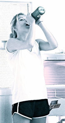 Image: Halee Turner hydrates during a break in the action.