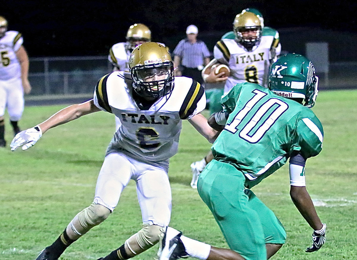 Image: Gladiator receiver Clayton Miller(6) blocks downfield for teammate Joe Celis(8).