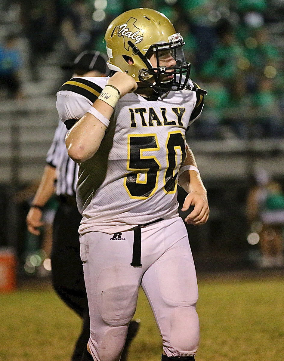 Image: Superhuman John Escamilla(50) blocked 3 point after kicks by the Bobcats. The third block was nullified by an offsides penalty charged to Italy.