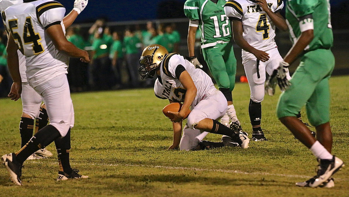 Image: Italy freshman Kyle Tindol(12) hustles downfield to cover a punt for the Gladiators.