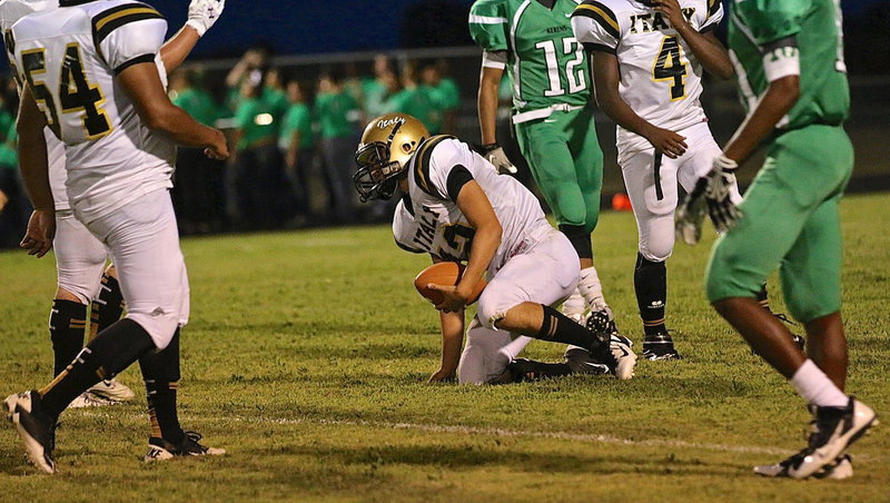 Image: Italy freshman Kyle Tindol(12) hustles downfield to cover a punt for the Gladiators.