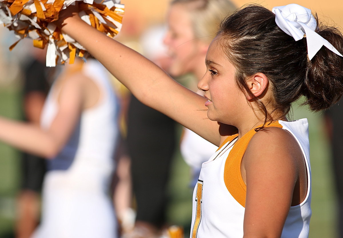 Image: Hannah Carr cheers her heart out for the gold and white!