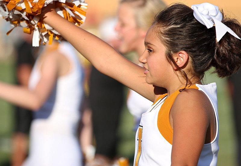 Image: Hannah Carr cheers her heart out for the gold and white!