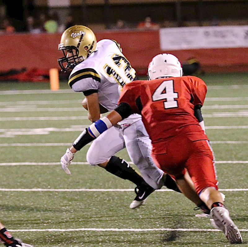 Image: Freshman Gladiator Kyle Tindol(12) catches a pass and then turns upfield.