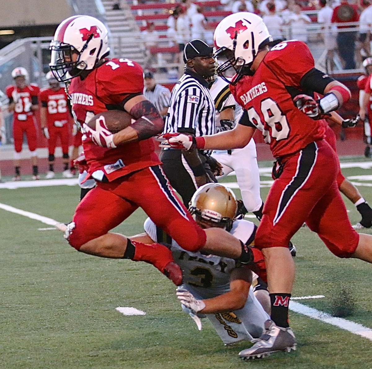 Image: Hunter Merimon(3) trips up a Panther before he can reach Italy’s endzone.